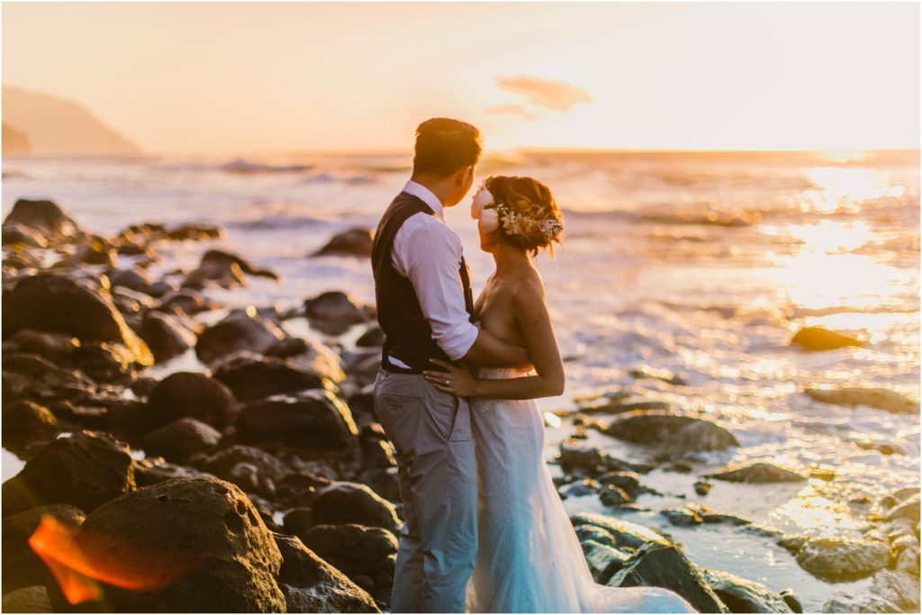 North Shore ke'e beach kauai hawaii elopement bride and groom at sunset on lava rocks photos by meg courtney