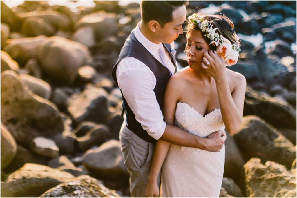 North Shore ke'e beach kauai hawaii elopement bride and groom at sunset on lava rocks- photos by meg courtney