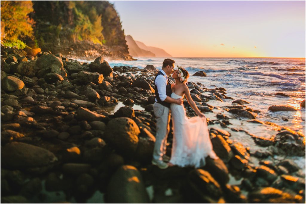 North Shore ke'e beach kauai hawaii elopement bride and groom at sunset on lava rocks- photos by meg courtney