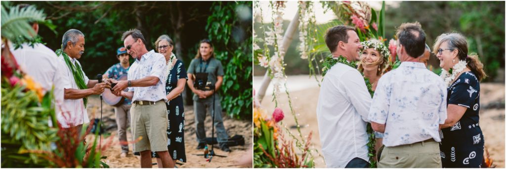 bride and groom hug guests after ceremony kauai hawaii emotional wedding 