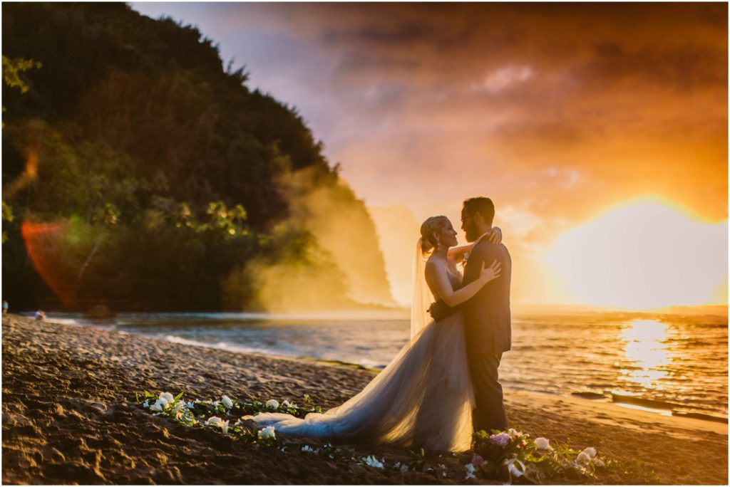 bride and groom at ke'e beach kauai wedding elopement hawaii north shore